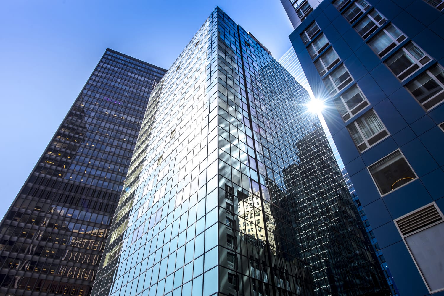 Modern office tower representing national title operations